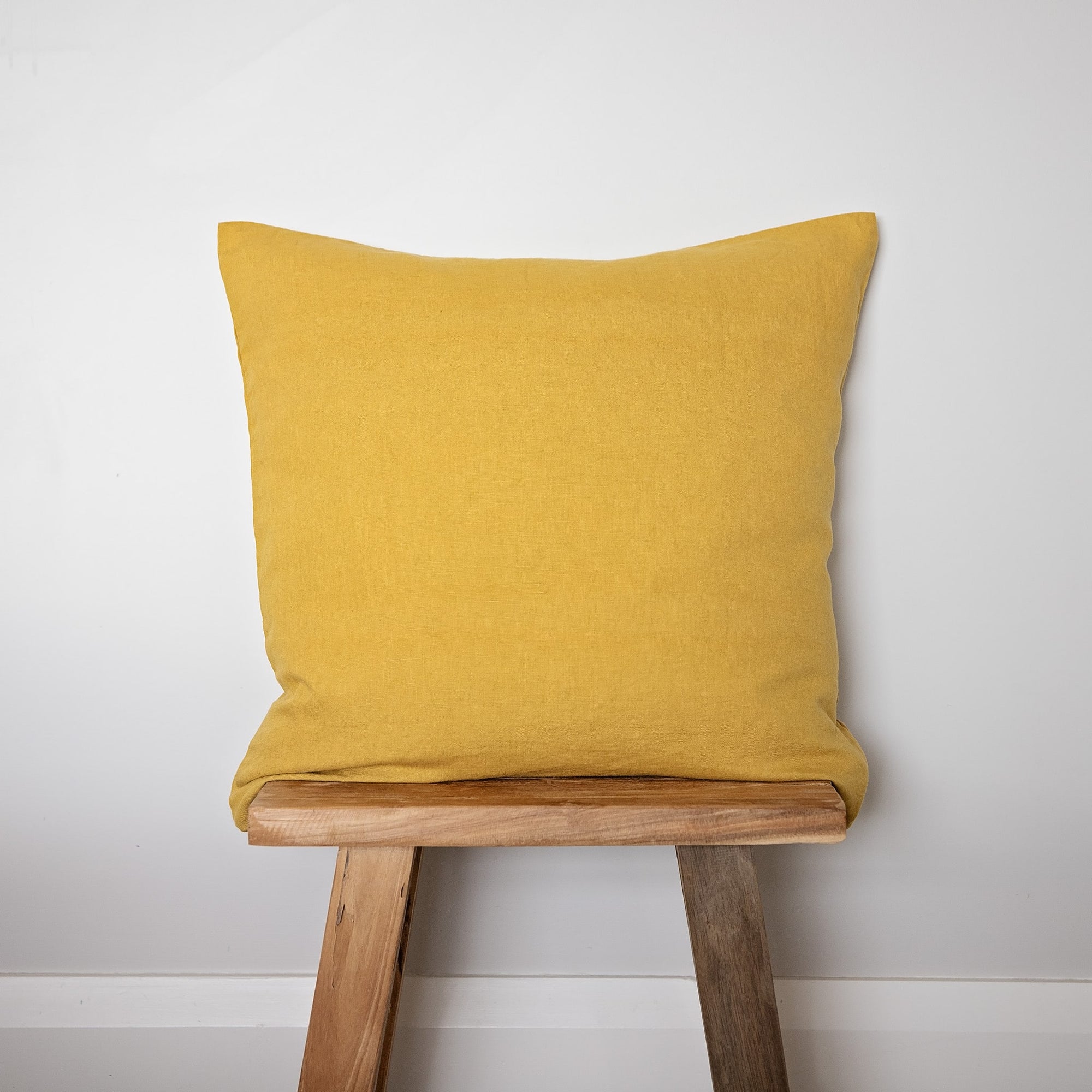 ochre linen cushion cover