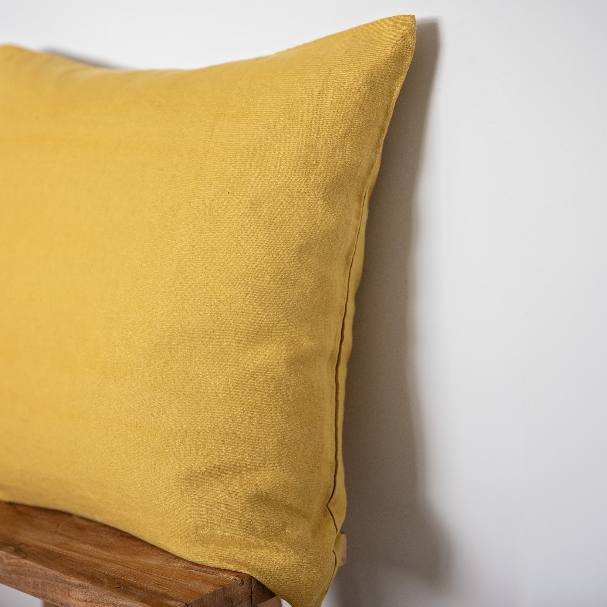 ochre linen cushion cover