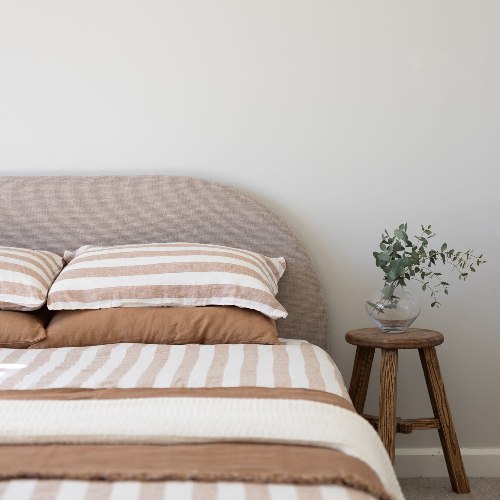 Hazelnut Stripe reversible linen bedding with Sol throw and Hazelnut linen pillowcases 